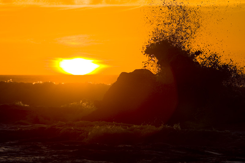 Sun Setting Behind Waves